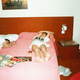 Illustration for article titled Time traveling photographer adds herself into her childhood pictures